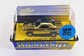 Gold 1970 Plymouth Hemi Cuda race car in a display box for Bought Collections Unidentified cuda-gold