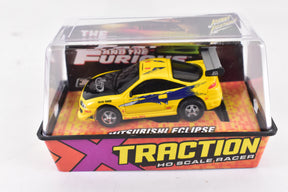Yellow and blue ho scale model car in a clear plastic display box for Bought Collections Unidentified eclipse-yellow