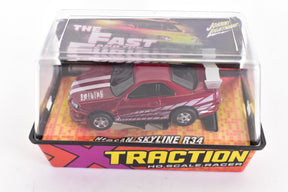 Red Nissan Skyline R34 model car in a clear display box for Bought Collections Unidentified skyline-red