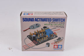 Sound activated switch kit components in a cardboard box for Tamiya 75012