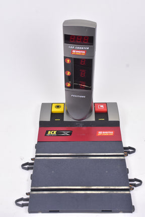 Digital lap counter with display and attached base unit for SCX Old Digital 25030