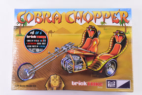Model kit box art featuring a colorful, stylized chopper motorcycle for AMT Model Kit MPC896