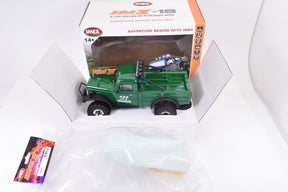 Green 1:18 scale crawler toy with accessories in open box for IMX IMX25010