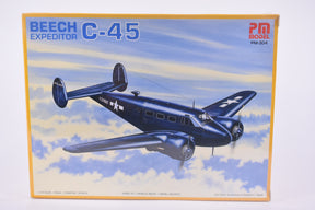 Blue Beech Expeditor C-45 model kit box art featuring the aircraft in flight for PM Model PM-304