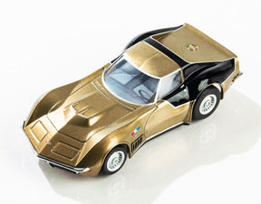 Gold and black model car, 1969 AstroVette LMP12 for AFX/Racemasters 22093, front view