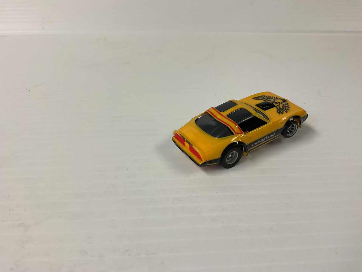 Tomy/Aurora AFX magnatraction Pontiac, Firebird Trans Am, mustard/black | 1981 | Aurora - AFX