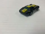 Aurora AFX magnatraction  Corvette, a production, one piece, body black with yellow stripes | 1927 | Aurora - AFX