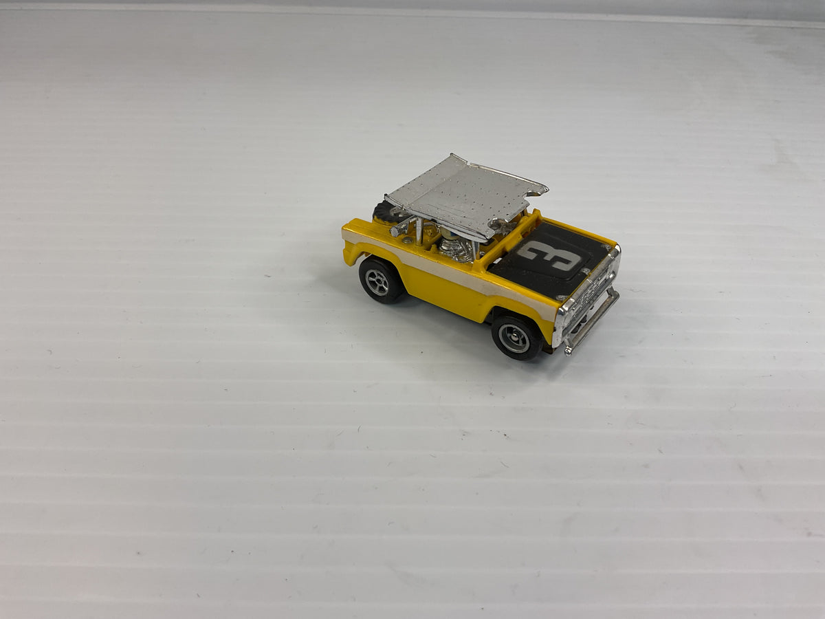 Aurora AFX non-magnatraction Ford Baja Bronco Yellow/Black/White #3 | 1769 | Aurora - AFX