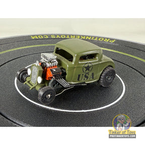 Green 32 Coupe Hot Rod with "USA" marking on a black surface for Extreme 3D Customs Extreme 3D Customs, front view