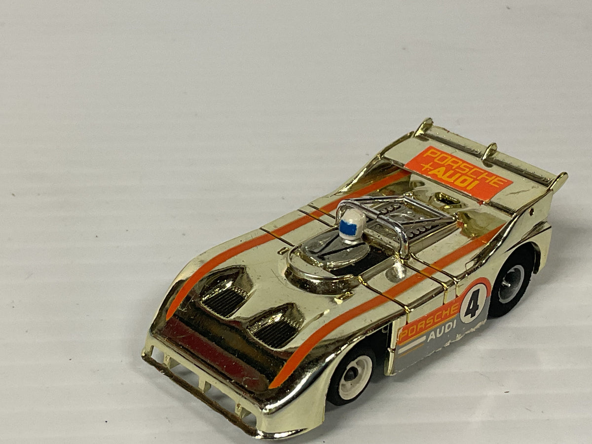 Aurora AFX G-plus Porsche 510K "Can Am" gold chrome/Orange #4  | 1743 | Aurora - AFX