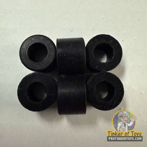 Six black, circular, tire-like pieces for model vehicles for Tyco 6694