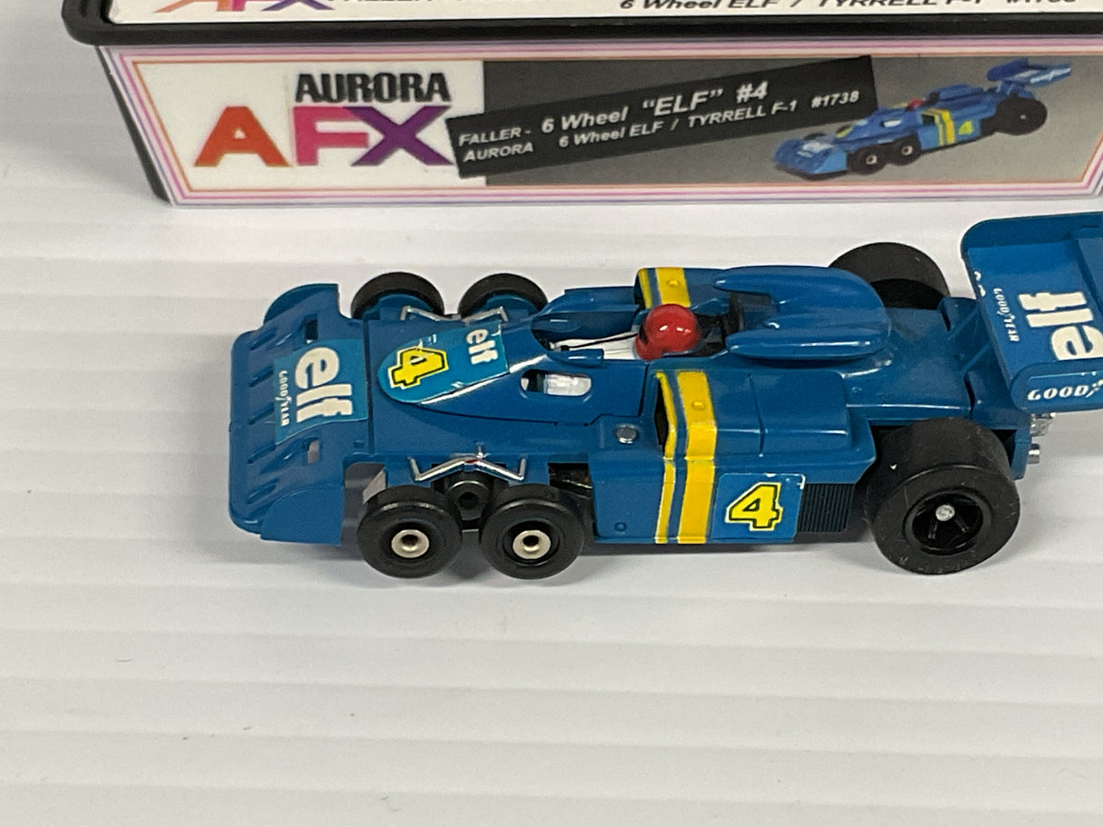 Aurora AFX Faller Aurora 6 Wheel Tyrrell F-1  Elf #4 | 1738 | Aurora - AFX