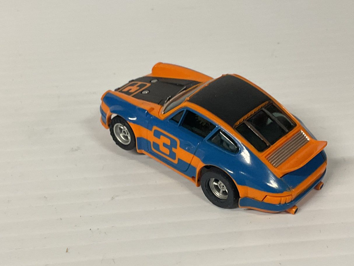 Aurora AFX magnatraction Porsche Carrera Orange/Blue/black #3   | 1933 | Aurora - AFX