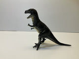 Black T-Rex dinosaur model standing on a white surface for Mamejo MAJ33000, front view