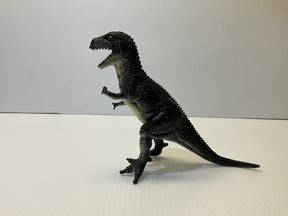 Black T-Rex dinosaur model standing on a white surface for Mamejo MAJ33000, front view