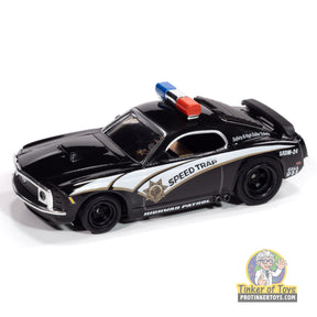 Black 1970 Ford Mustang toy car with white stripes, marked "SPEED TRAP." for Auto World SC414