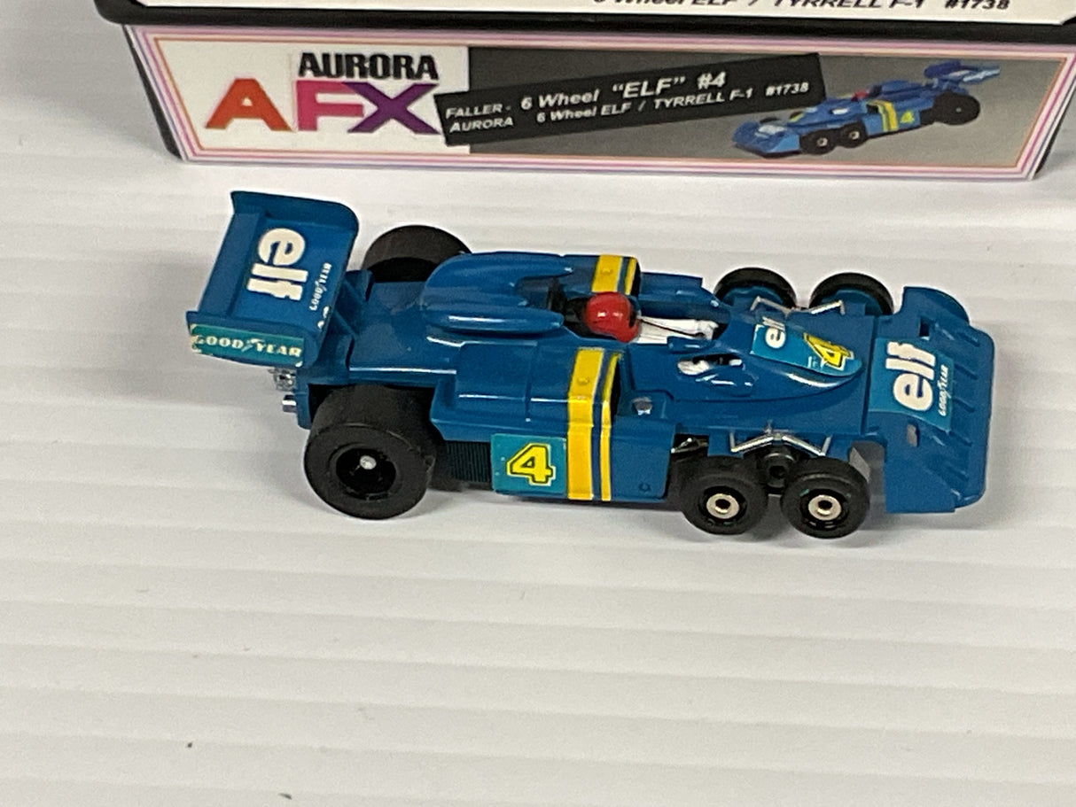 Aurora AFX Faller Aurora 6 Wheel Tyrrell F-1  Elf #4 | 1738 | Aurora - AFX