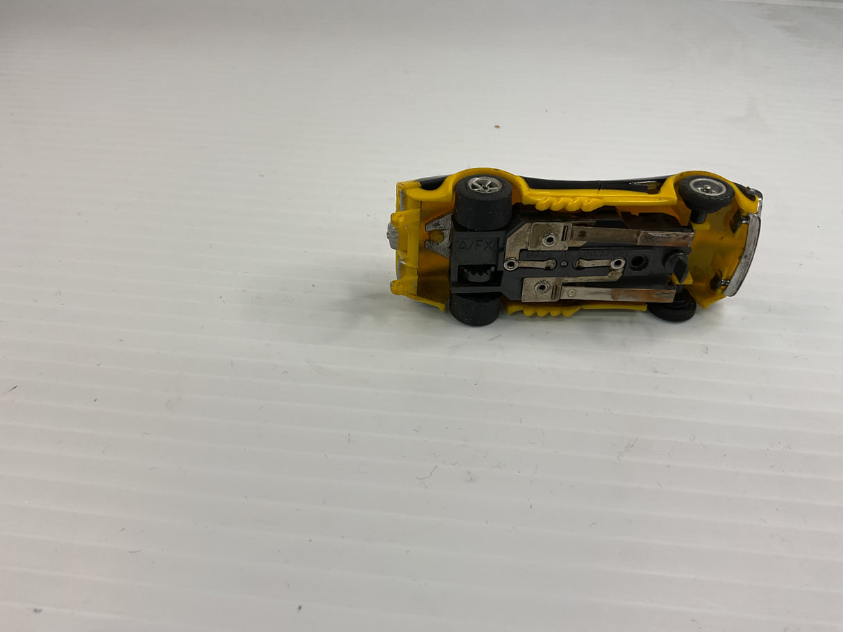 Aurora AFX non-magnatraction Corvette Funny Car Yellow/Black | 1766 | Aurora - AFX