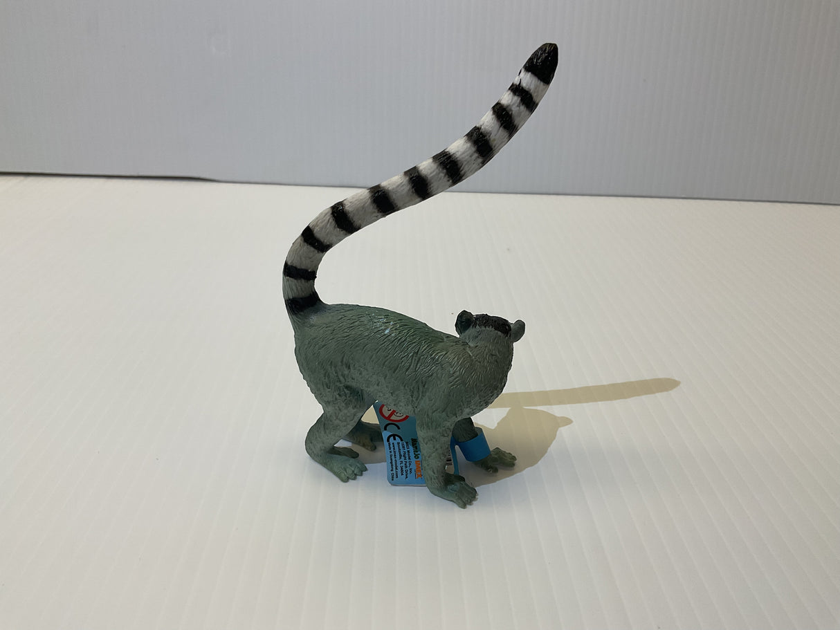 Small grey lemur toy with striped tail, standing on a white surface for Mamejo MAJ55028