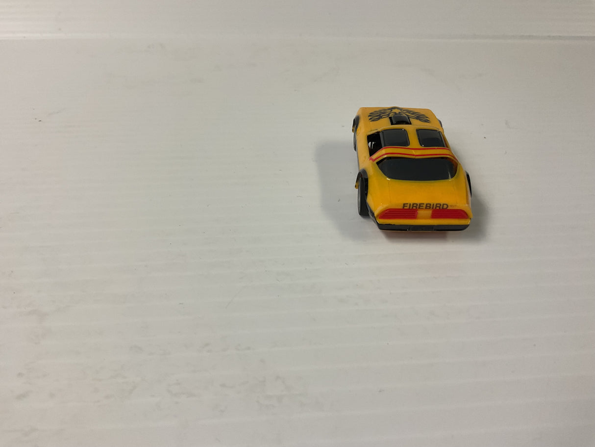 Tomy/Aurora AFX magnatraction Pontiac, Firebird Trans Am, mustard/black | 1981 | Aurora - AFX