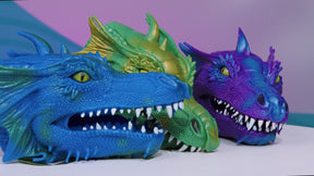 Three colorful, snarling dinosaur hand puppets lined up for Toysmith 6246