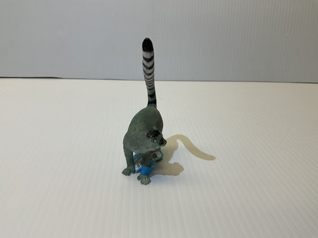 Stuffed grey lemur toy standing on a white surface for Mamejo MAJ55028