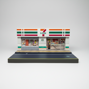 Scale model of a brightly lit 7-Eleven store facade diorama for Shou Cang Jia IMX2575