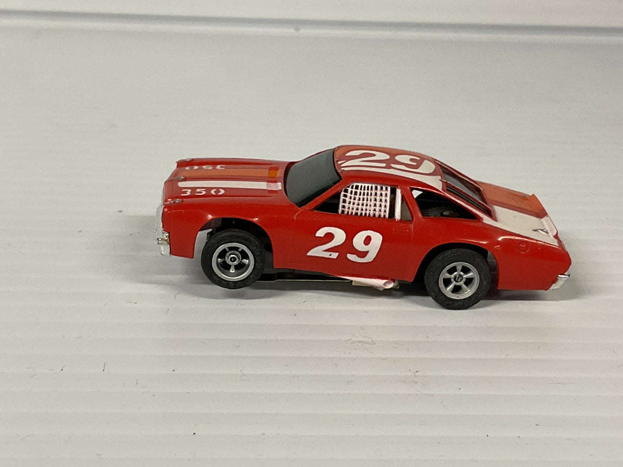 Aurora AFX non-magnatraction lighted Chevelle Stocker red/white/orange #29  | 1975 | Aurora - AFX
