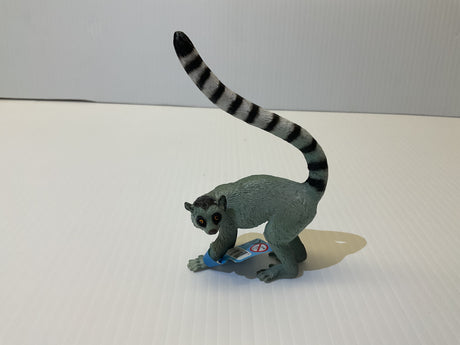 Grey lemur figurine with long, striped tail standing on a base for Mamejo MAJ55028
