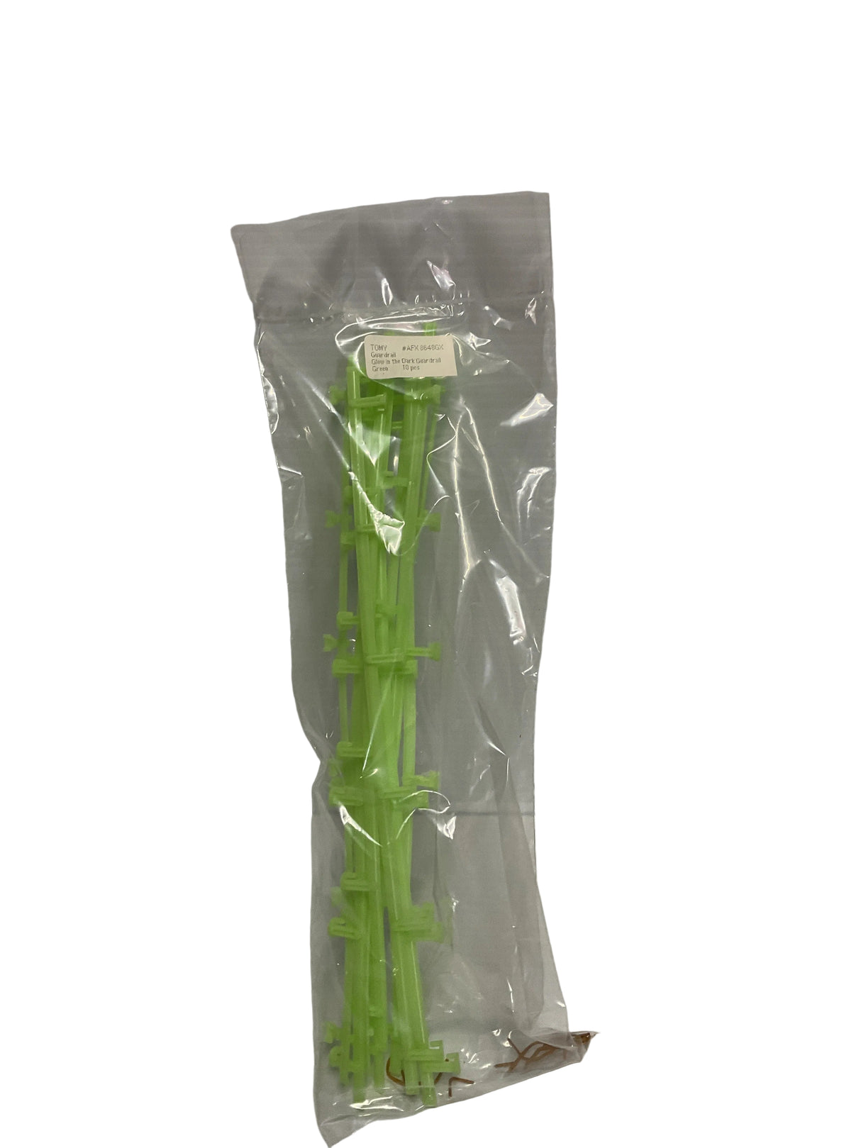 Green guard rail pieces in clear plastic packaging for Aurora Tomy AFX Vintage AFX8648GX