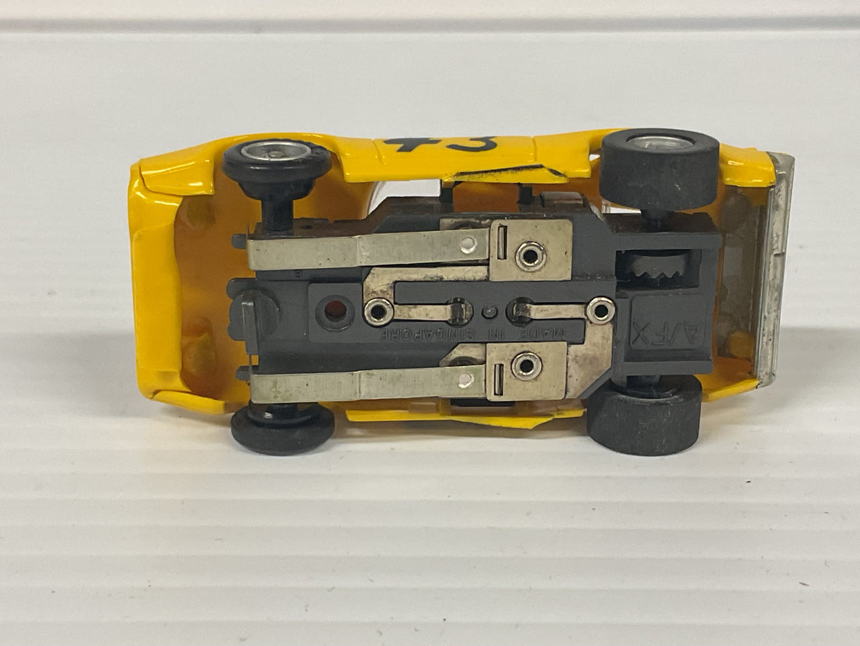 Aurora AFX non-magnatraction Plyouth Road Runner Stock Car Yellow #43 | 1762 | Aurora - AFX
