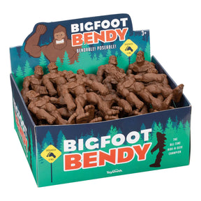 Brown, bendable toy figures in a green and blue cardboard box for toy Smith 9391