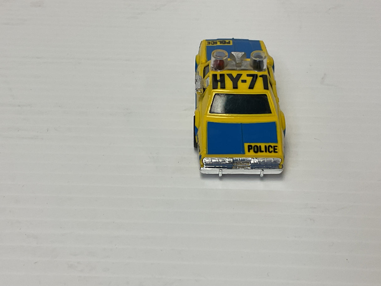 Aurora AFX maga-traction Chevy pursuit car with overhead roof lights blue, and yellow | 1979 | Aurora - AFX