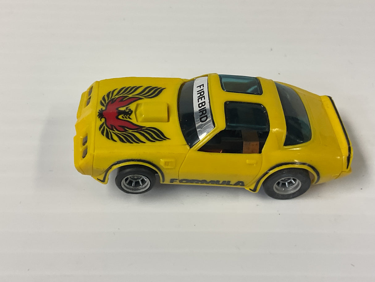 Aurora AFX magnatraction Pontiac, Firebird Trans Am, mustard/black/red bird | 1981 | Aurora - AFX