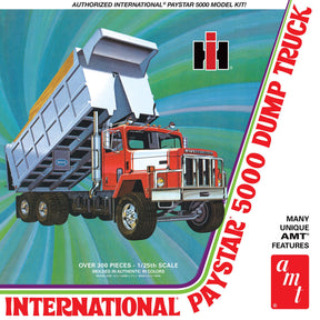 Dump truck model kit box art showing a red and white dump truck for AMT AMT1381