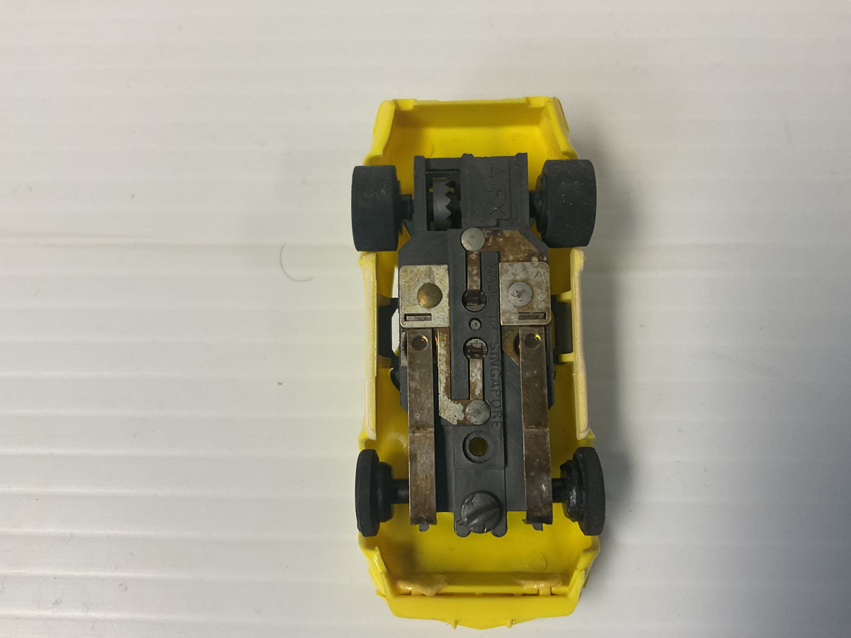 Aurora AFX non-magnatraction  Corvette, a production, one piece, body yellow with black stripes | 1703 | Aurora - AFX