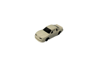 White toy car resembling a classic Ford Thunderbird for Tyco B6922W, front view