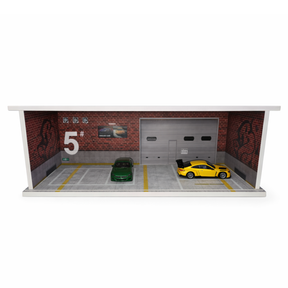 Diorama garage scene with two diecast cars parked in front of a garage door for Shou Cang Jia IMX2563