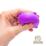 Purple cat putty held in a hand for Schylling CCTND