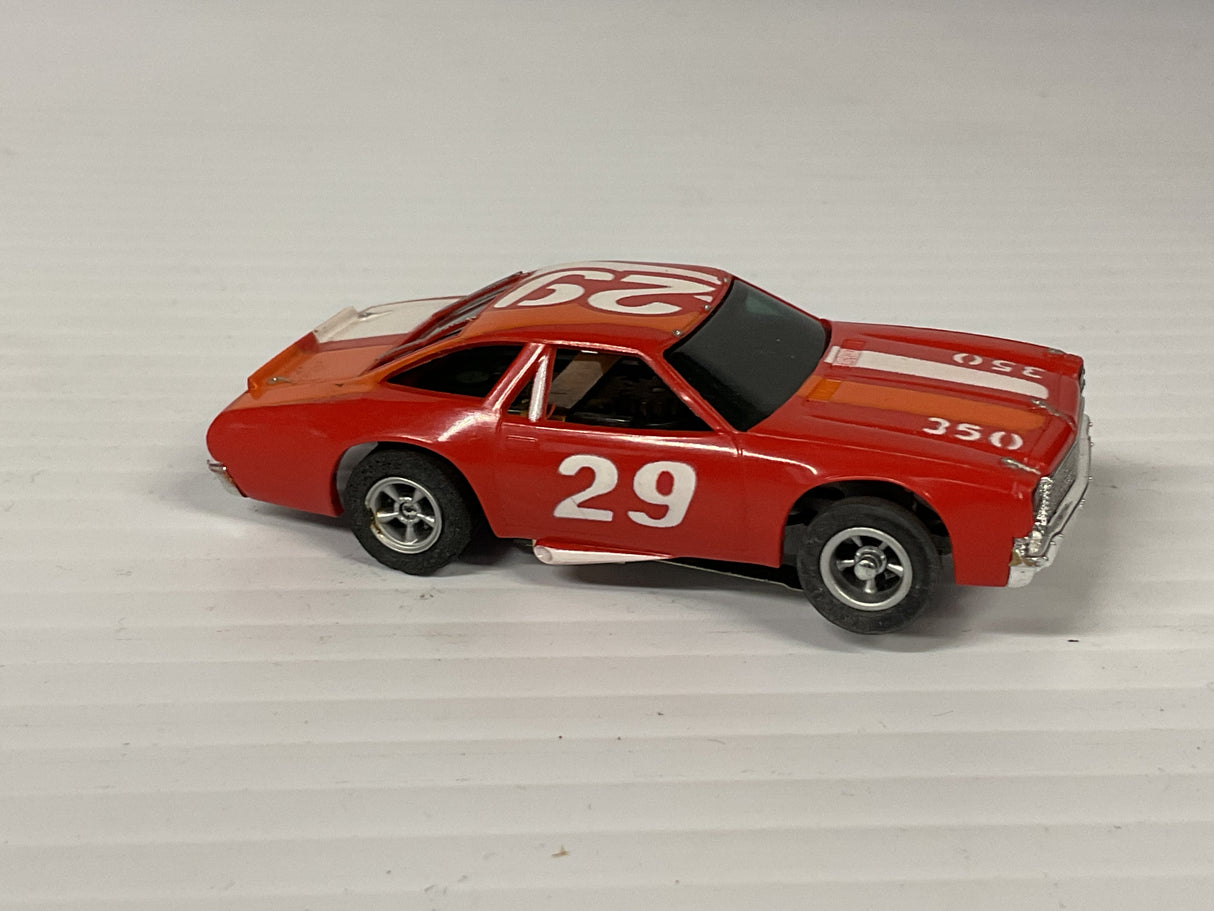 Aurora AFX non-magnatraction lighted Chevelle Stocker red/white/orange #29  | 1975 | Aurora - AFX