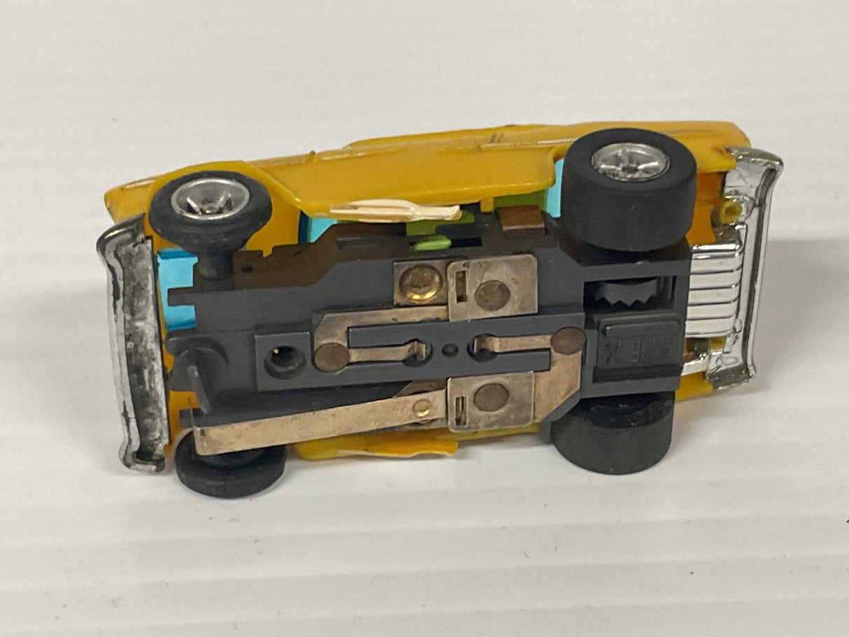Aurora AFX non-magnatraction 1955 Bel Air Yellow White pipes   | 1777 | Aurora - AFX