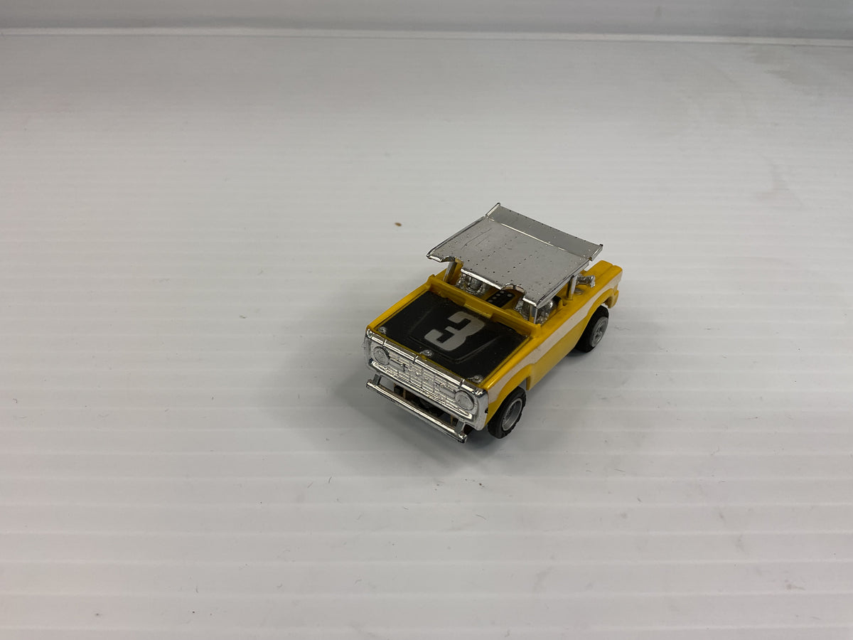 Aurora AFX non-magnatraction Ford Baja Bronco Yellow/Black/White #3 | 1769 | Aurora - AFX