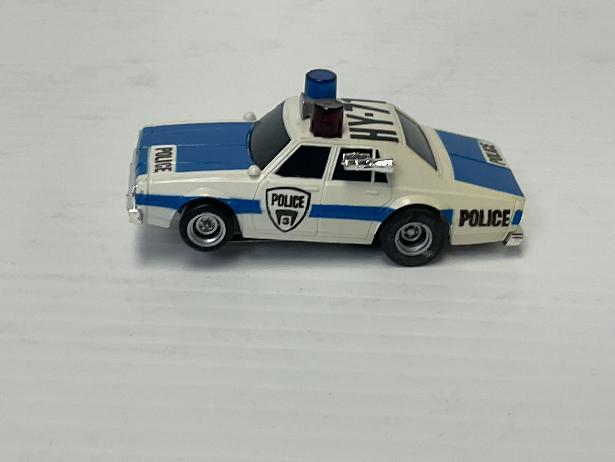 Aurora AFX maga-traction Chevy pursuit car with overhead roof lights blue, and white | 1979 | Aurora - AFX