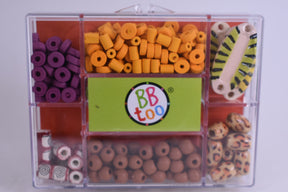 Assortment of colorful beads and craft supplies in a clear storage case for BBTOO 742