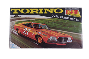 Orange 1:25 scale model car, Torino Oval Track Racer, on a racetrack for Jo-Han C-3372