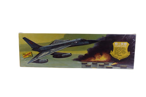 B-58 Hustler bomber model kit box art showing aircraft over a burning area for Lindberg 578