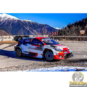 Toyota Yaris WRC rally car on snowy mountain road for SCX Advance E10524X300
