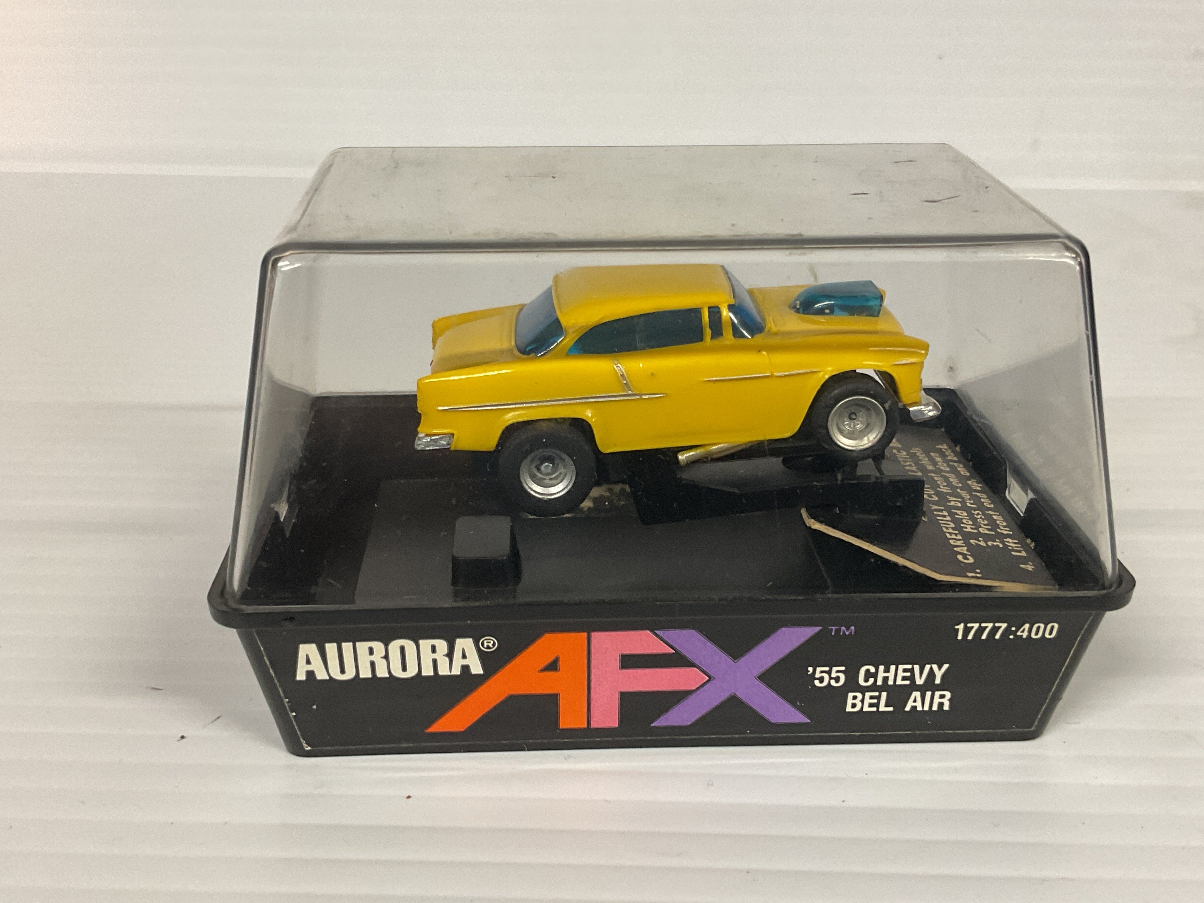 Aurora AFX 1955 Cheyv Bel Air Yellow/Silver Pipes magnatraction