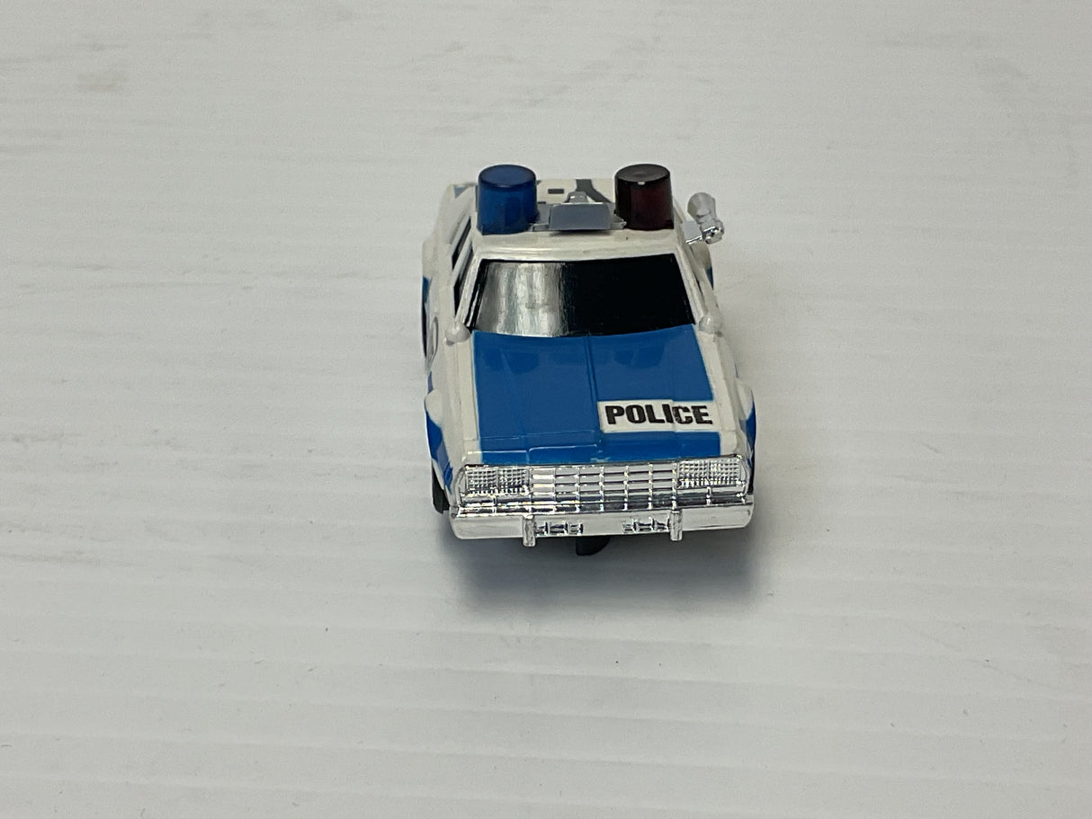 Aurora AFX maga-traction Chevy pursuit car with overhead roof lights blue, and white | 1979 | Aurora - AFX
