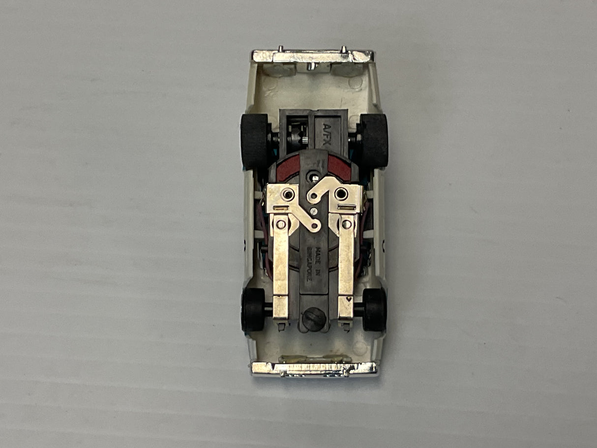 Aurora AFX maga-traction Chevy pursuit car with overhead roof lights blue, and white | 1979 | Aurora - AFX